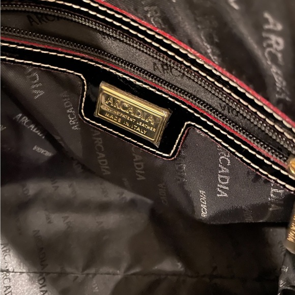 Black, embossed  patent leather tote w/ red trim. Beautiful work bag. - Picture 4 of 5